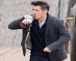 Colin Farrell consuming alcohol